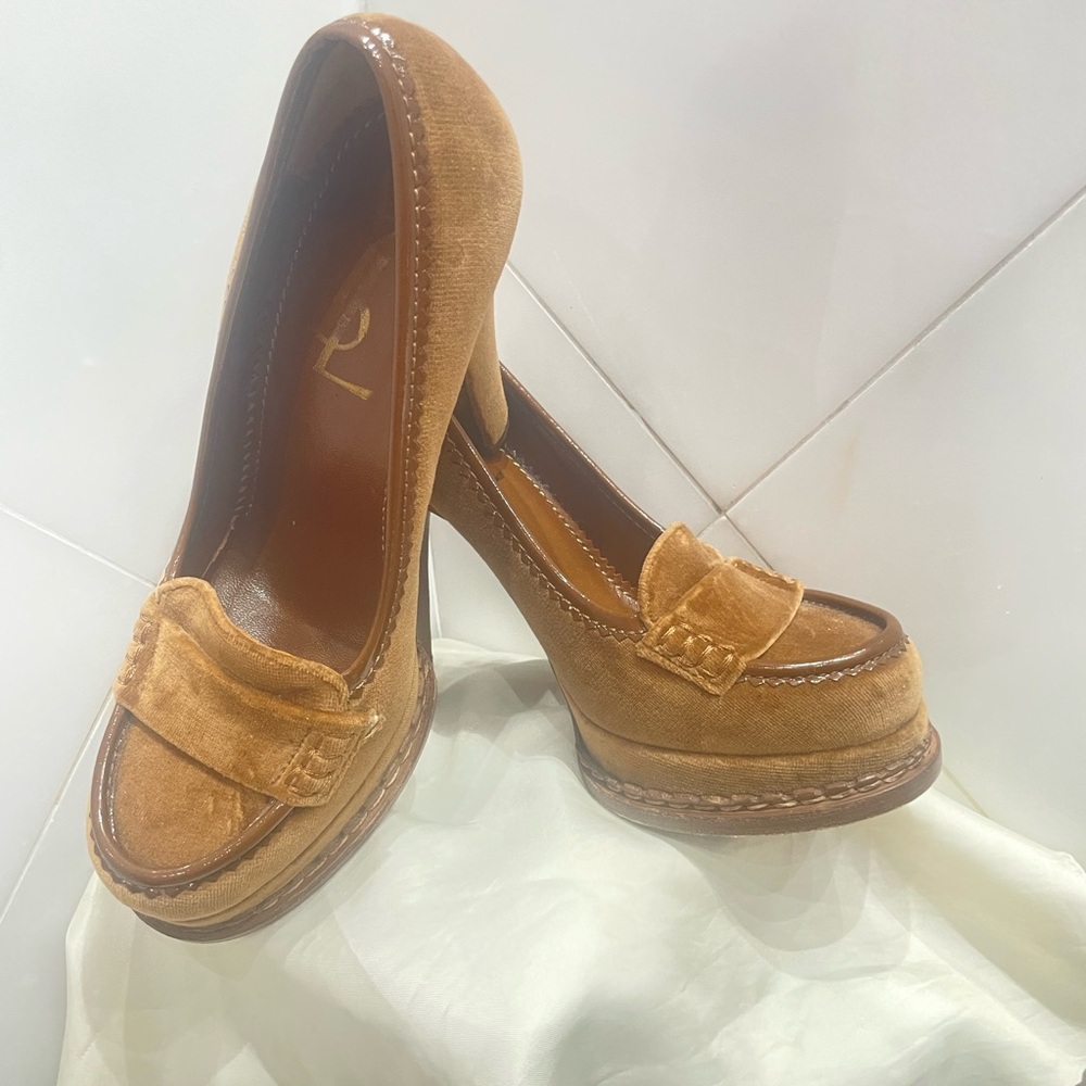 Yves, St. Laurent size 36 runs small